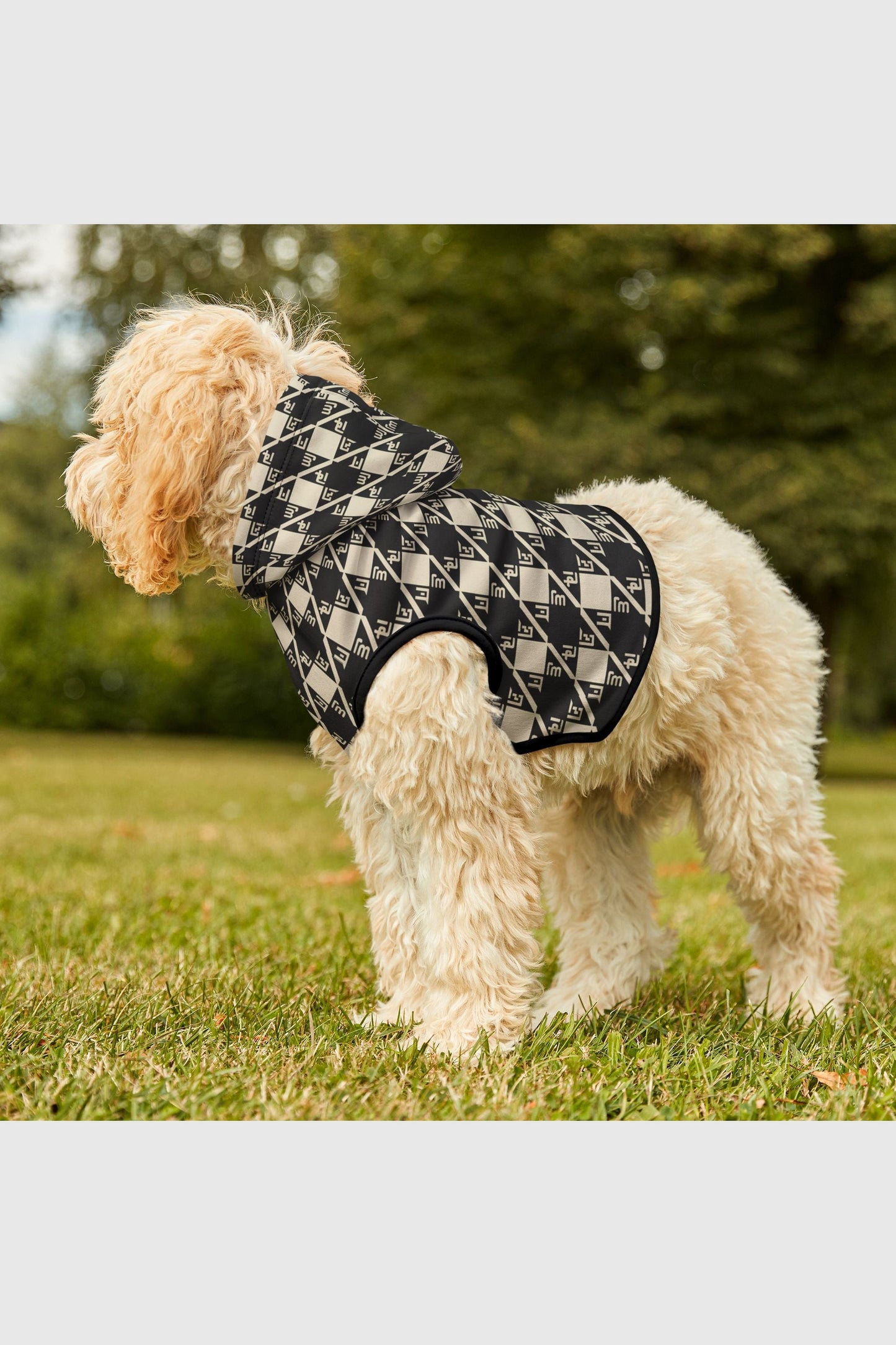 Diamond plaid pattern detail on black cream cozy dog hoodie