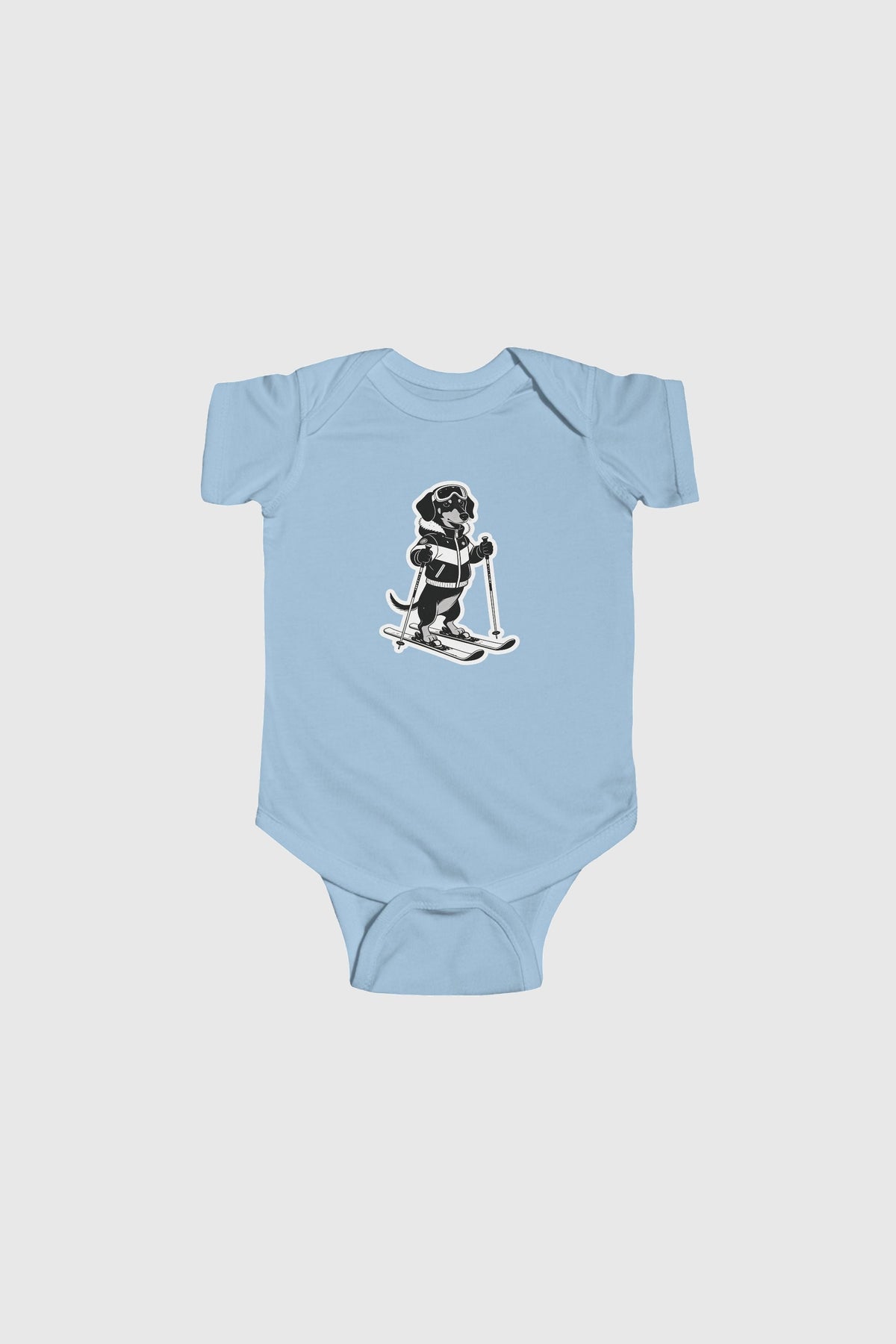 Baby wearing yellow skiing black labrador bodysuit