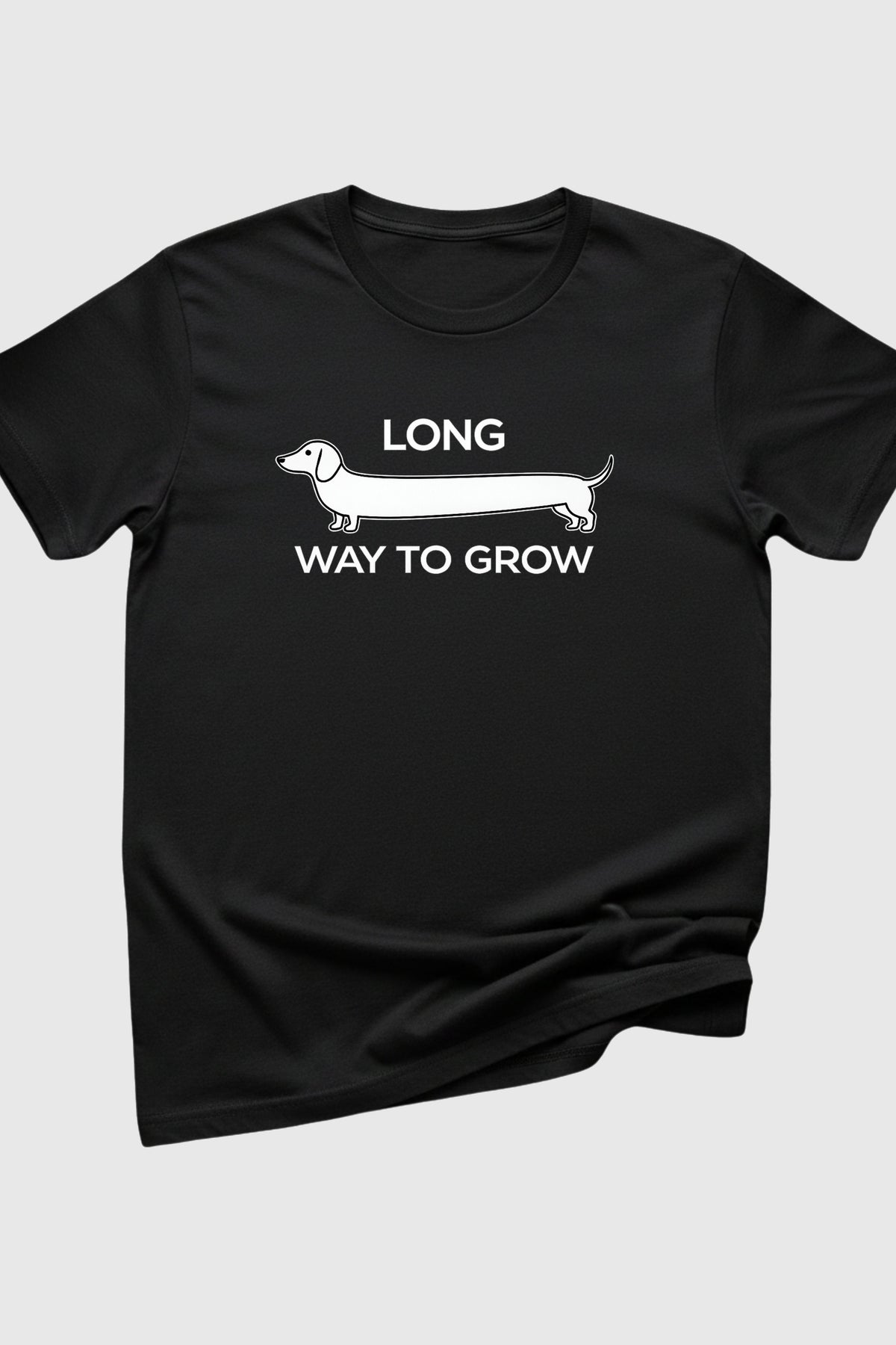 Woman wearing heather gray Long Way to Grow dachshund t-shirt