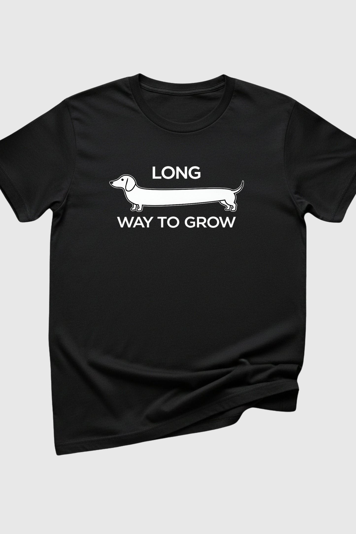 Woman wearing heather gray Long Way to Grow dachshund t-shirt