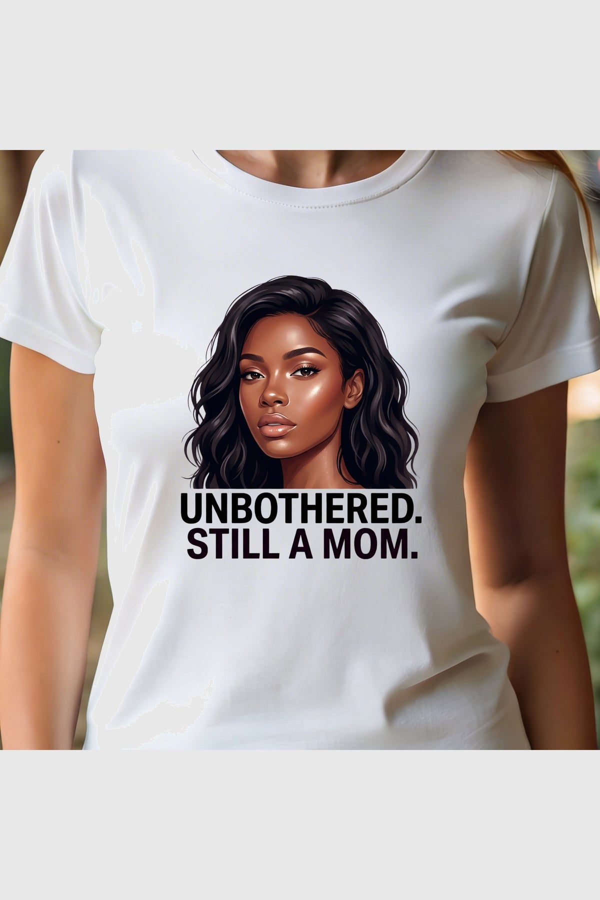 Unbothered Still A Mom print close-up on black t-shirt