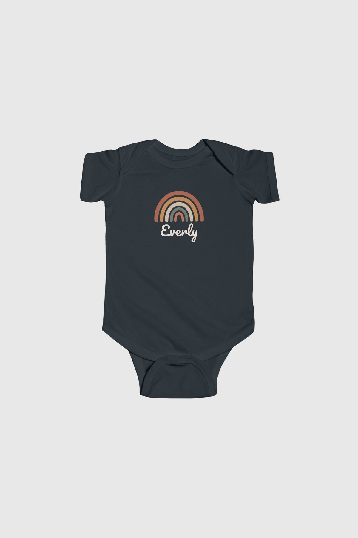 Baby wearing white personalized rainbow bodysuit, snap closure