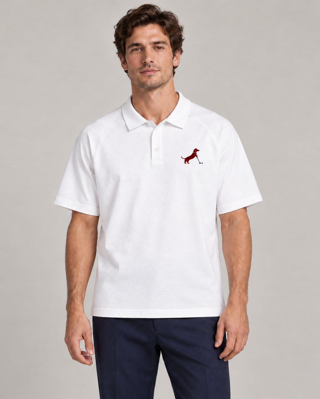 Man wearing Putting dachshund golf polo, front studio view. Color: White