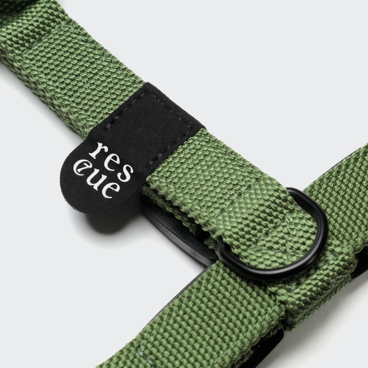 Green nylon dog harness side view, step-in design