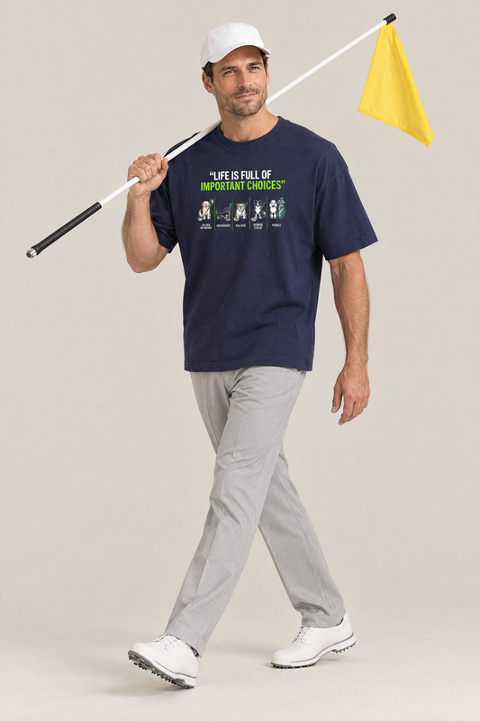 Man carrying a golf flagstick in the navy Full of Choices Dog Golf Tee. Color: Navy