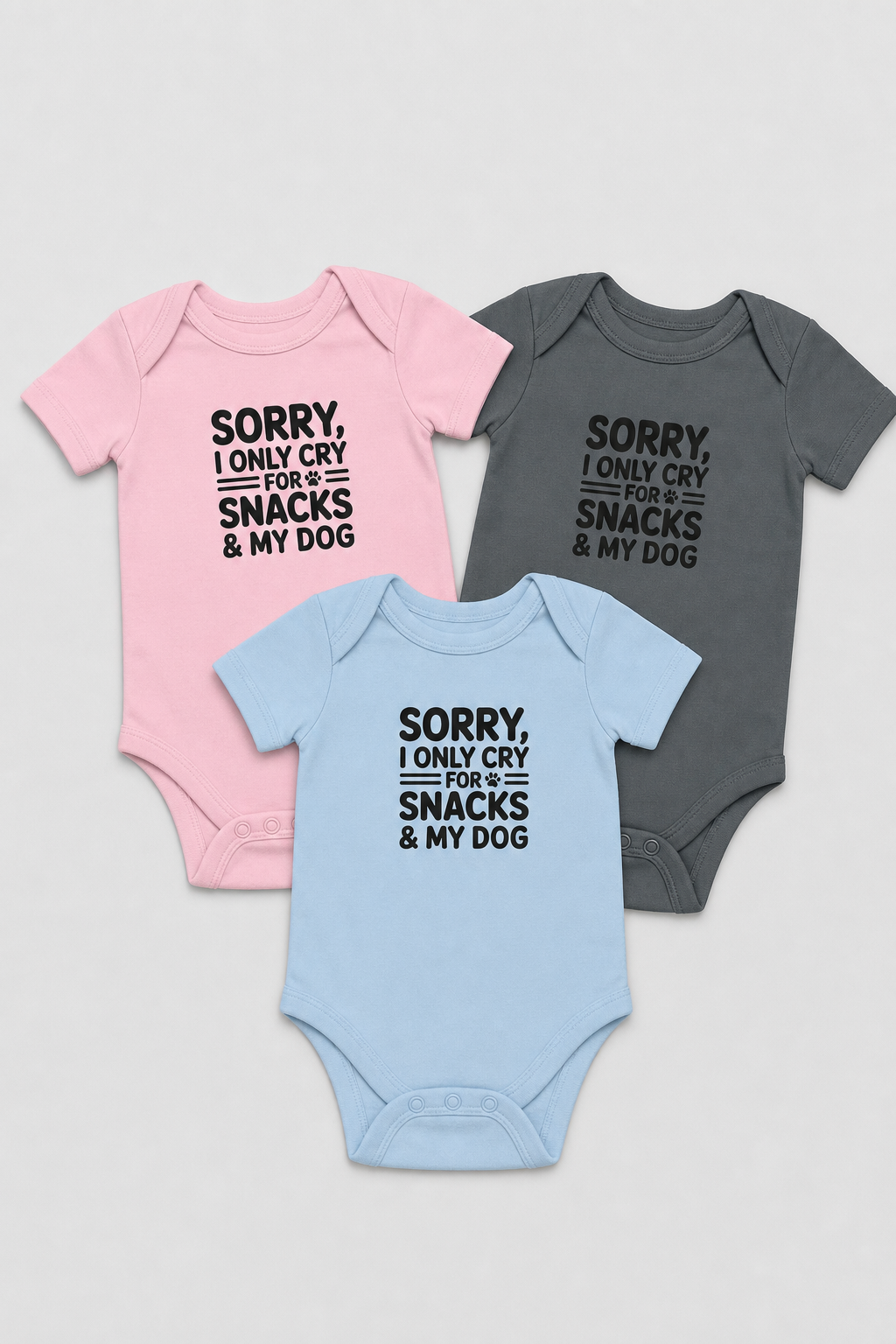 Baby wearing pink Sorry I Only Cry For Snacks bodysuit