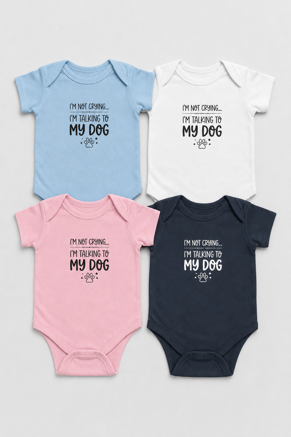 Baby wearing pink I'm Talking to My Dog bodysuit
