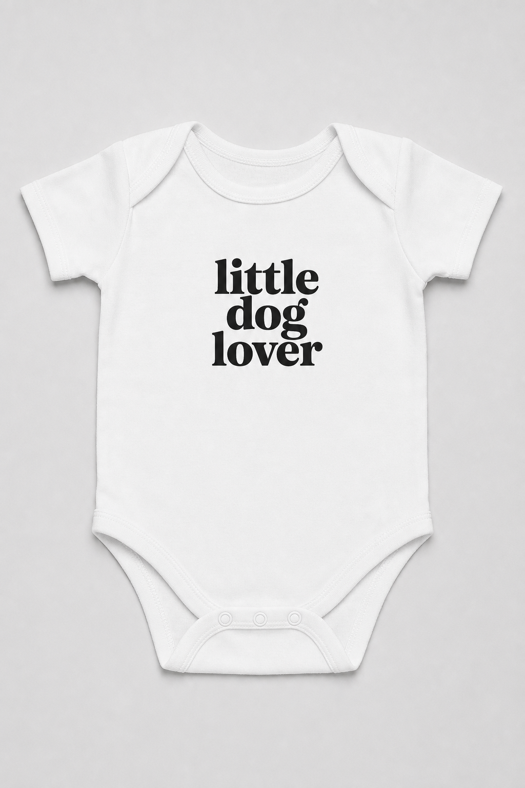 Pink baby bodysuit with Little Dog Lover print, snap closure
