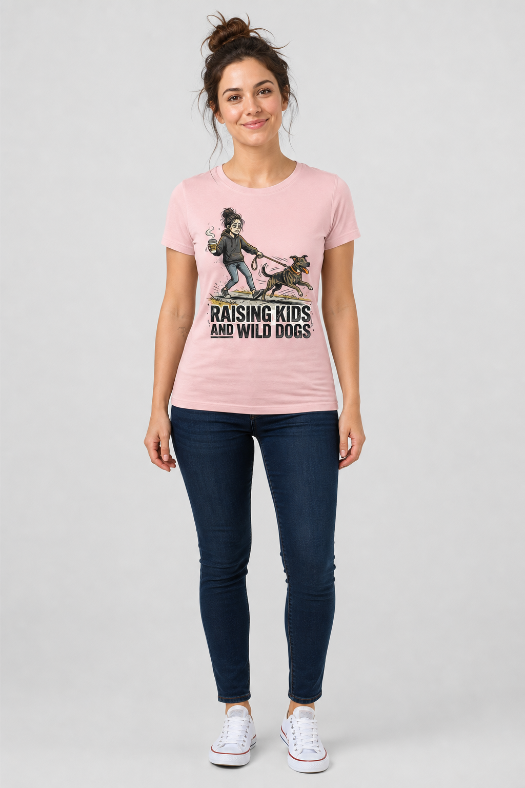 Woman wearing black Raising Kids and Wild Dogs t-shirt