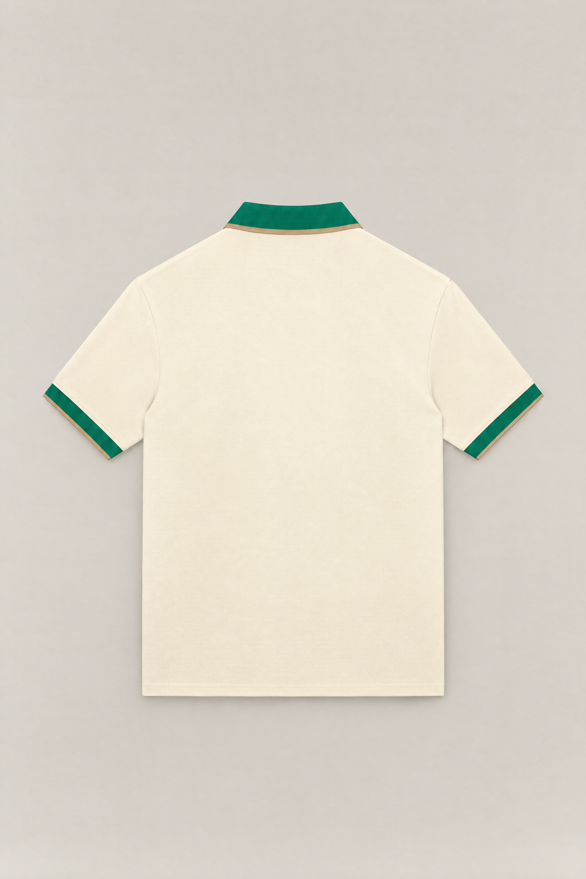 Club Crest color block polo in apricot with green collar and cuffs, back view packshot. Color: Apricot with Green