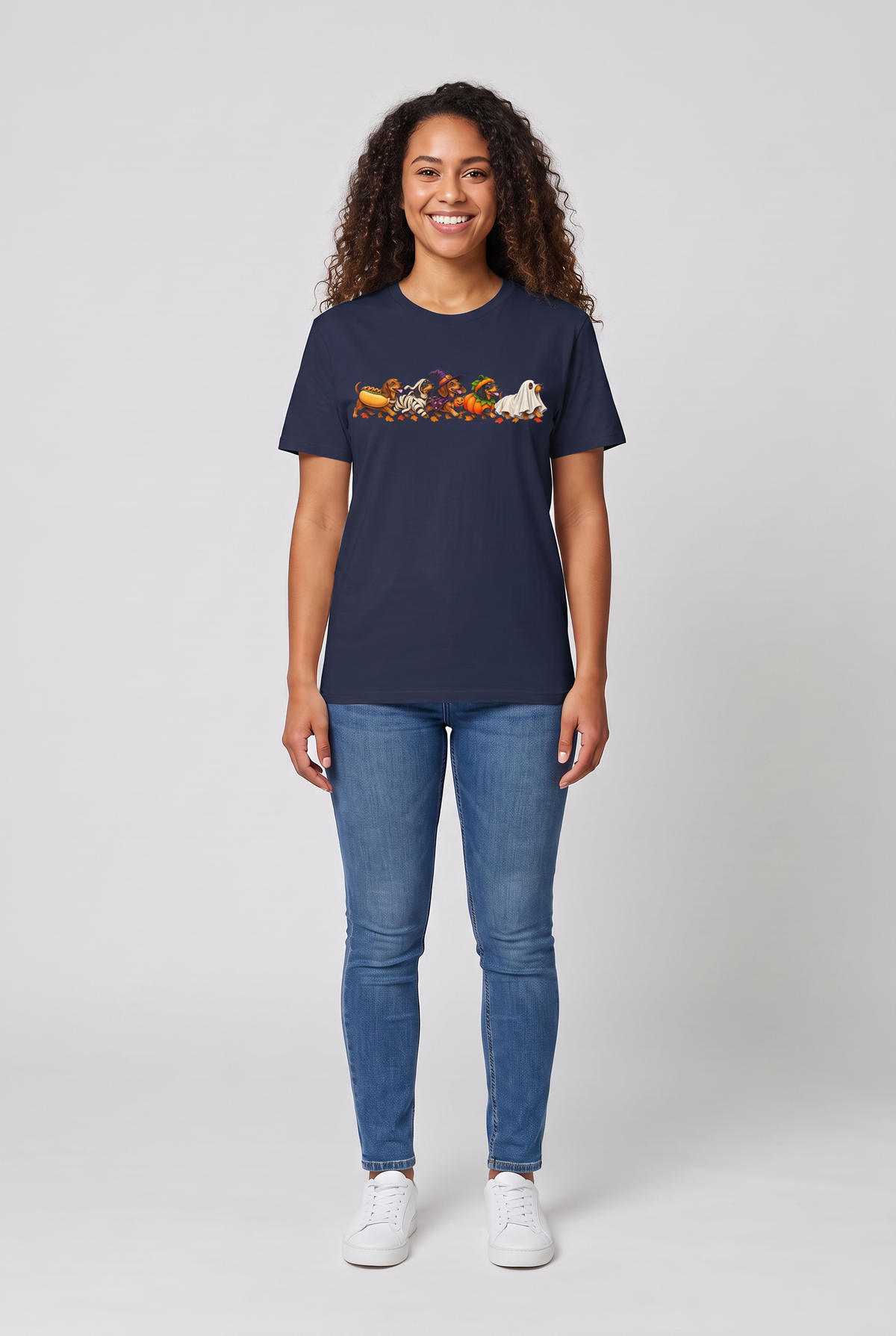 Woman wearing a navy wiener dog Halloween parade t-shirt with five dachshunds dressed as hot dog, mummy, witch, pumpkin and ghost, front view