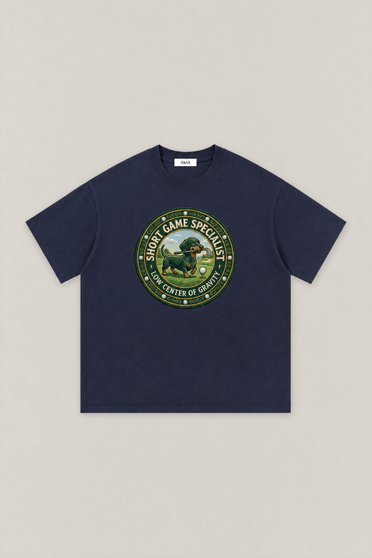 Short Game Crest Dachshund Golf Tee in navy, flat lay front view. Color: Navy