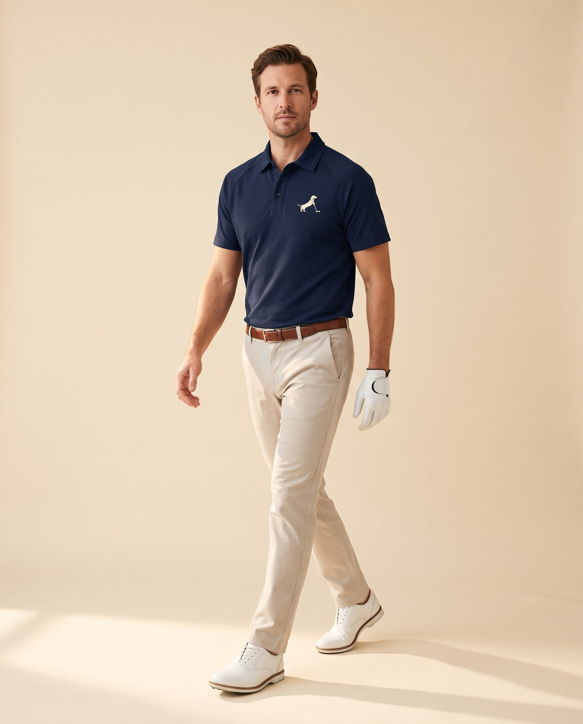 Man wearing Putting dachshund golf polo, full-body studio look. Color: Navy Blue