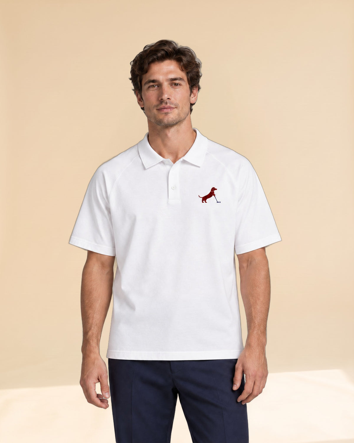 Man wearing Putting dachshund golf polo, front studio view. Color: White