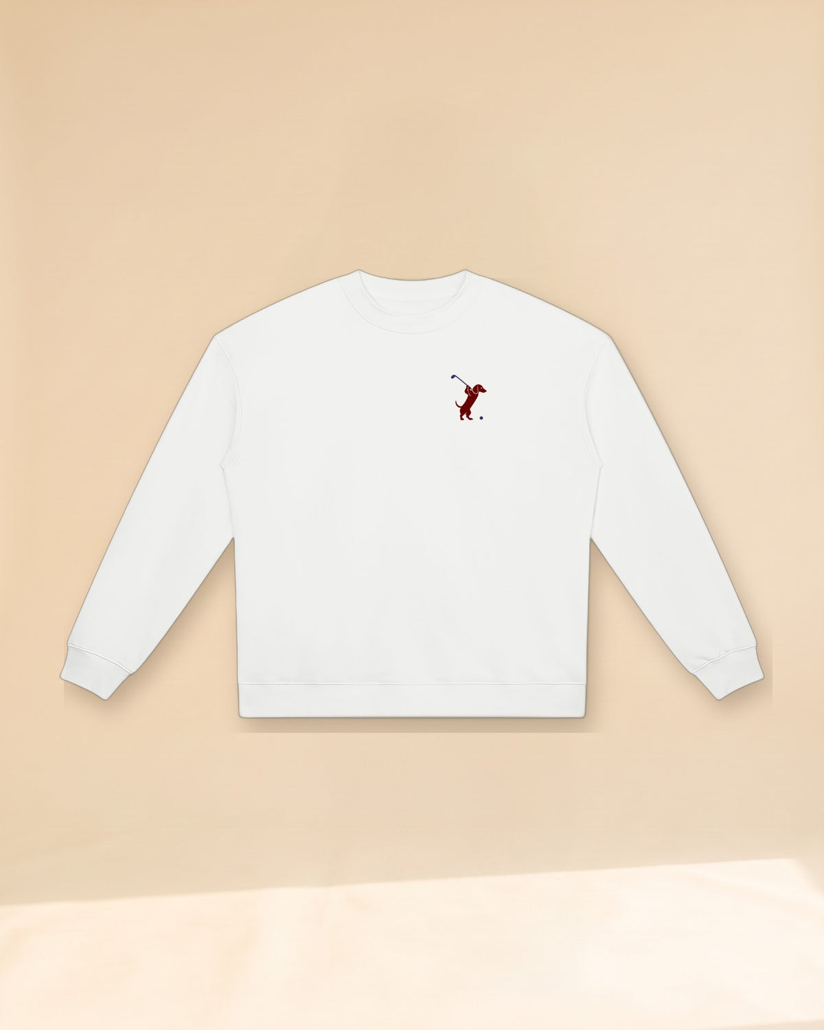 Swing dachshund golf sweatshirt, front flatlay. Color: White