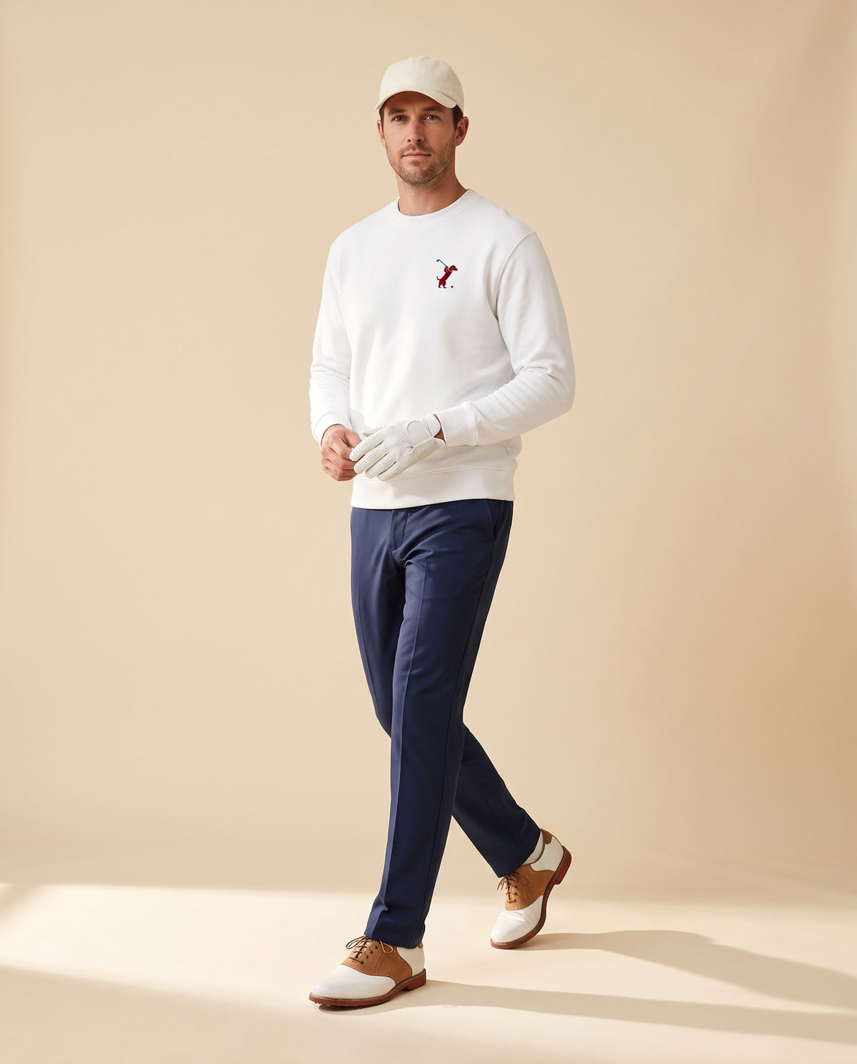 Man wearing Swing dachshund golf sweatshirt, full-body studio look. Color: White