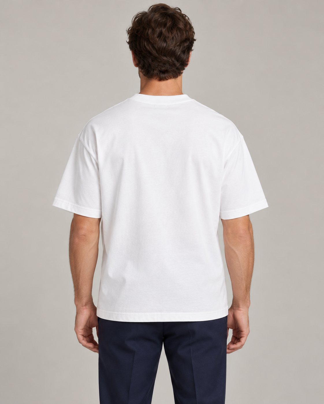 Man wearing Putting dachshund golf T-shirt, back studio view. Color: White