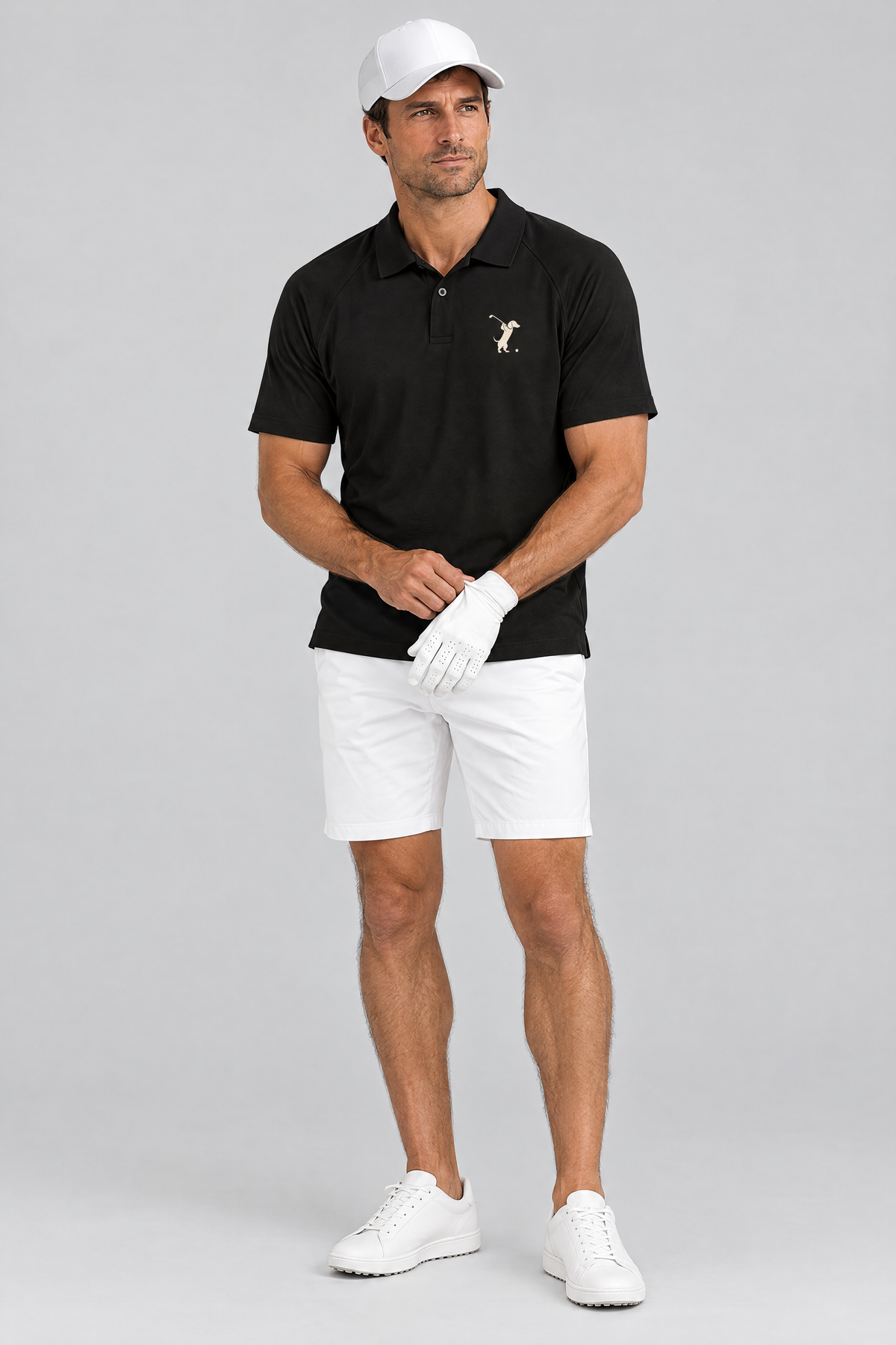 Man in a white cap pulling on a golf glove in the black Swing dachshund golf polo and white golf shorts. Color: Black