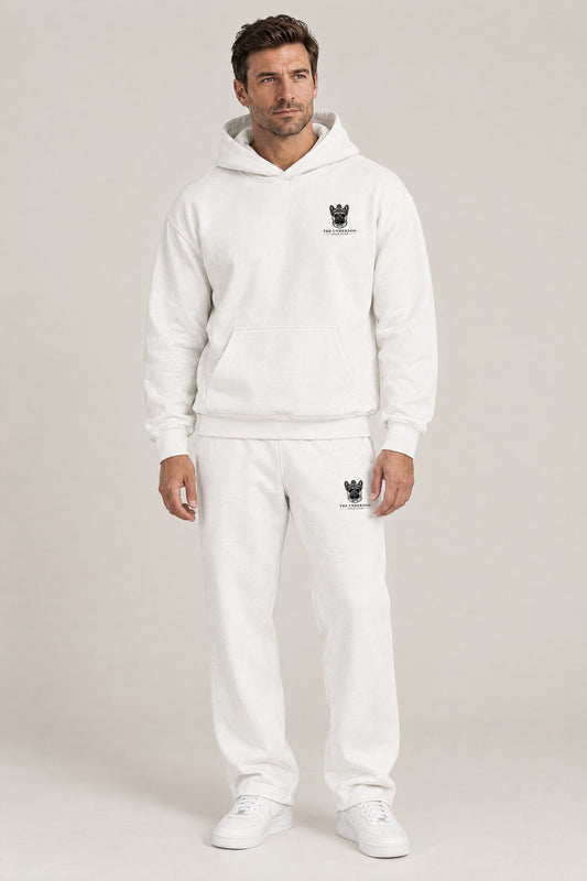 Man wearing The Marshal French Bulldog golf hoodie and matching Underdog Golf Club sweatpants in White, front view. Color: White