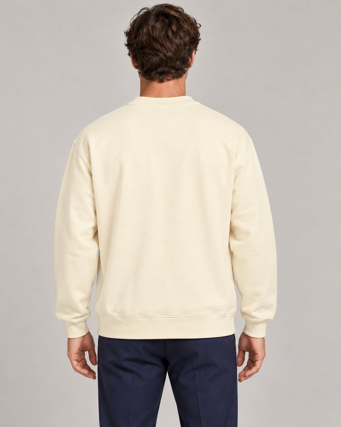 Man wearing Swing dachshund golf sweatshirt, back studio view. Color: Apricot