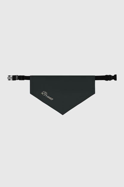 Golden retriever wearing black personalized dog bandana with custom name