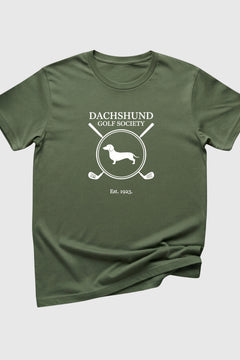 Woman wearing black dachshund golf society t-shirt