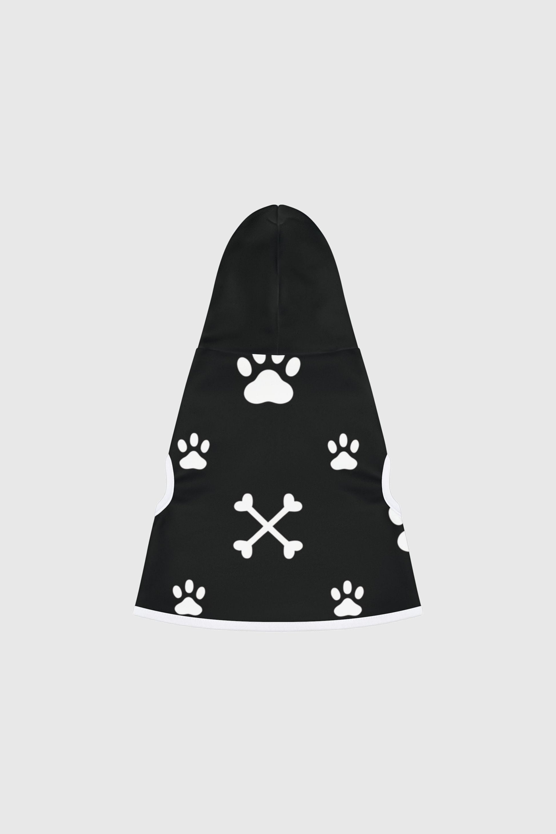 Basset hound wearing brown dog hoodie with paw print crossbones