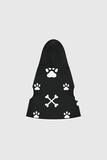 Basset hound wearing brown dog hoodie with paw print crossbones