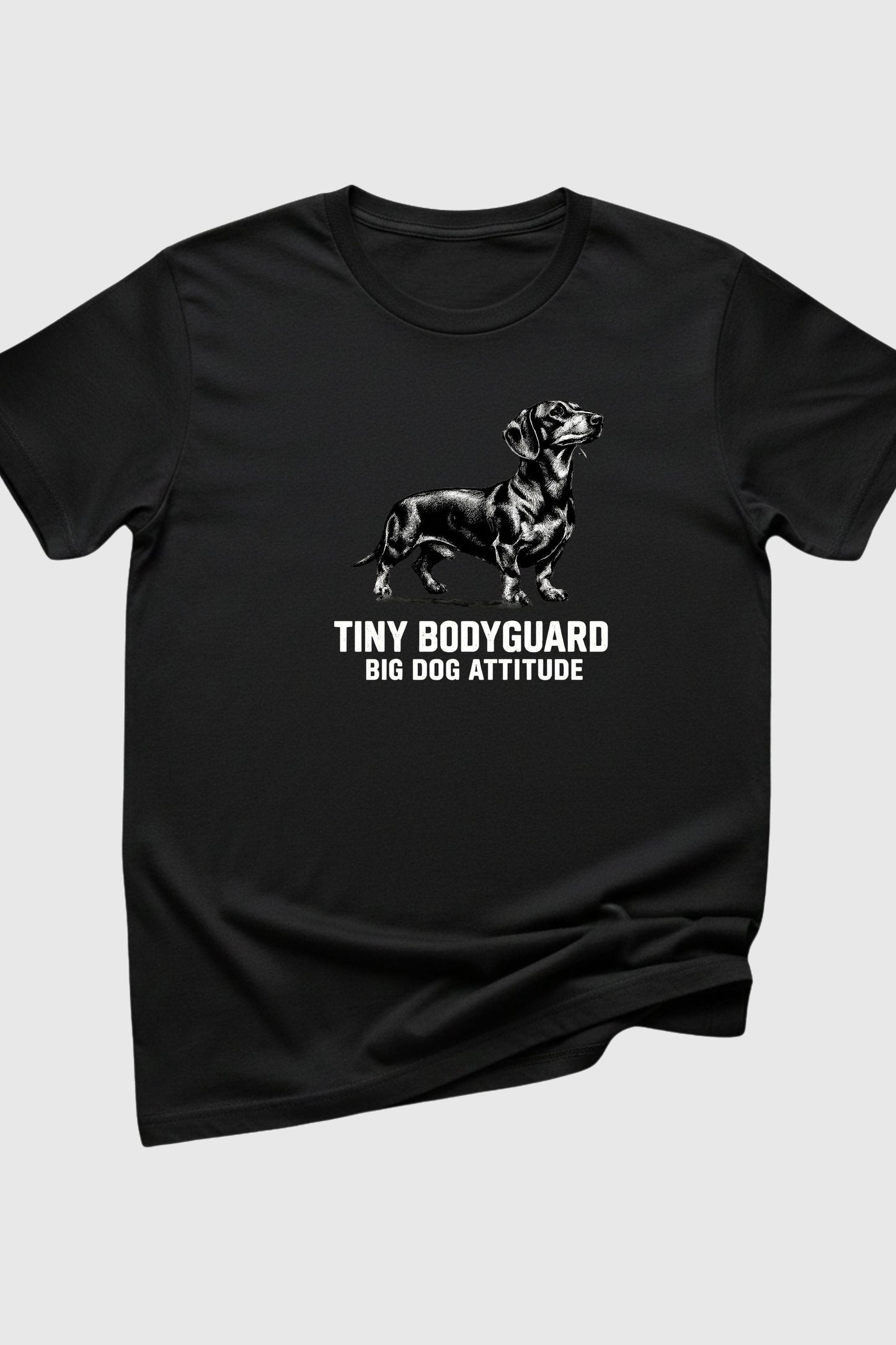 Black t-shirt with Tiny Bodyguard Big Dog Attitude dachshund print, unisex crew neck