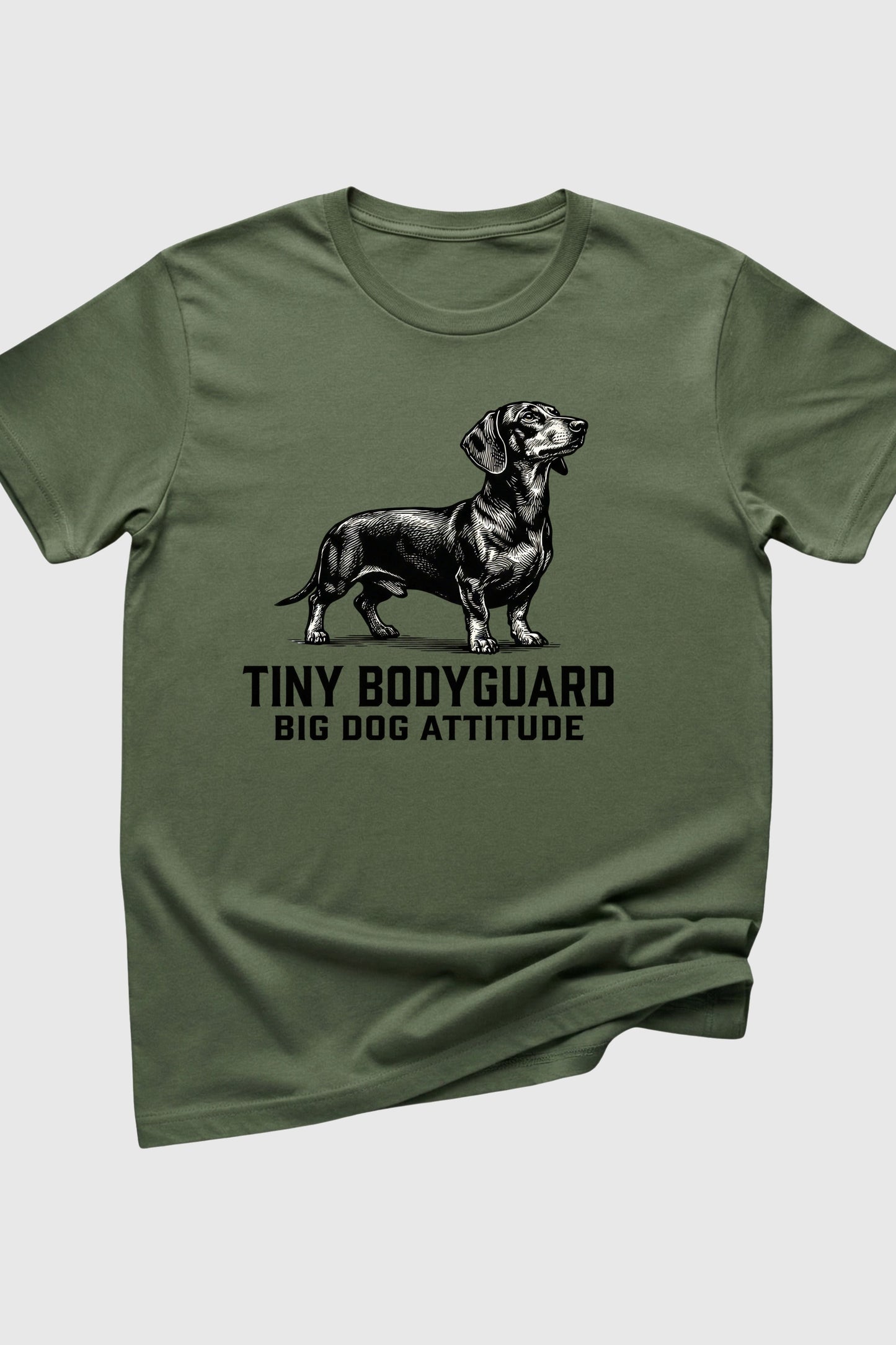 Woman wearing black Tiny Bodyguard Big Dog Attitude dachshund t-shirt