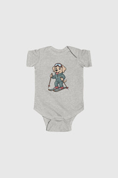 Yellow baby bodysuit with skiing labrador puppy print, snap closure