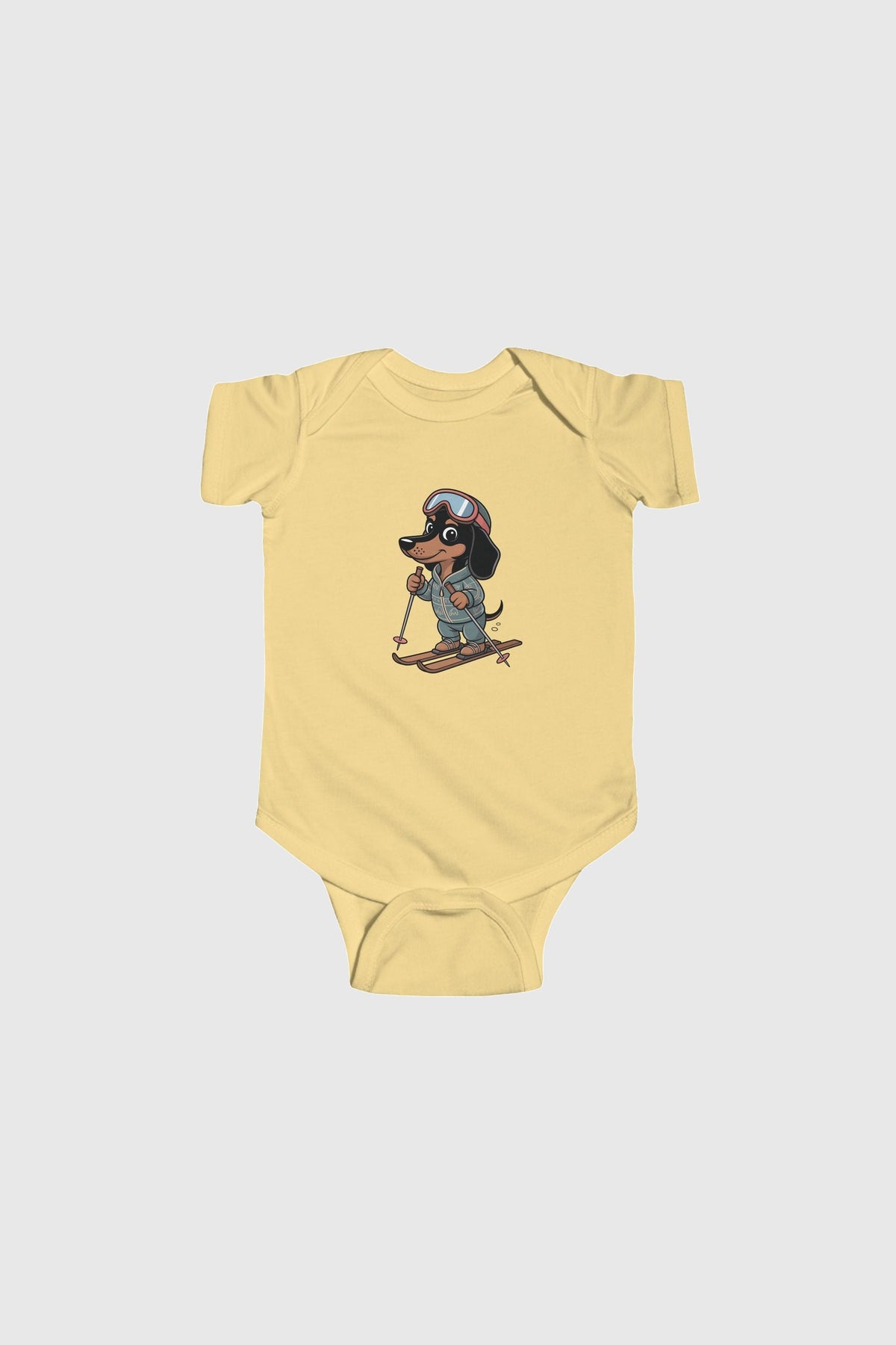 Yellow baby bodysuit with cute skiing dachshund print, snap closure
