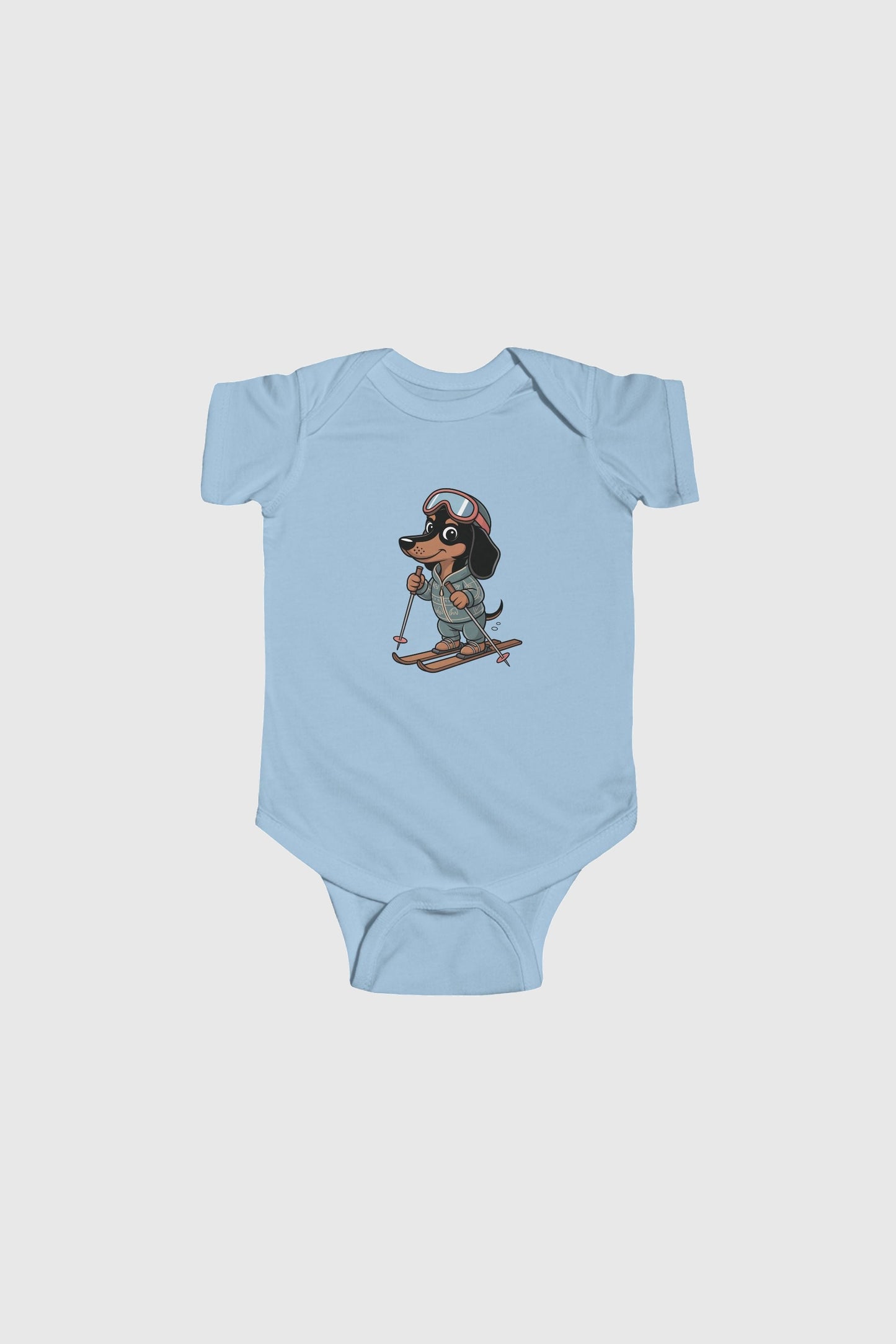 Baby wearing yellow skiing dachshund bodysuit