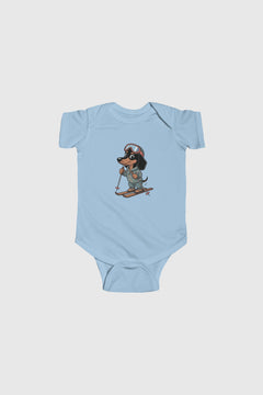 Baby wearing yellow skiing dachshund bodysuit