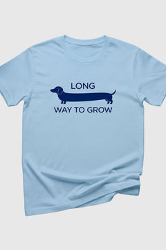 Man wearing black t-shirt with Long Way to Grow dachshund print