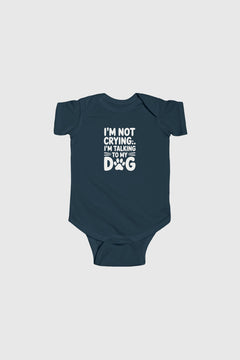Baby wearing light blue I'm Talking to My Dog bodysuit