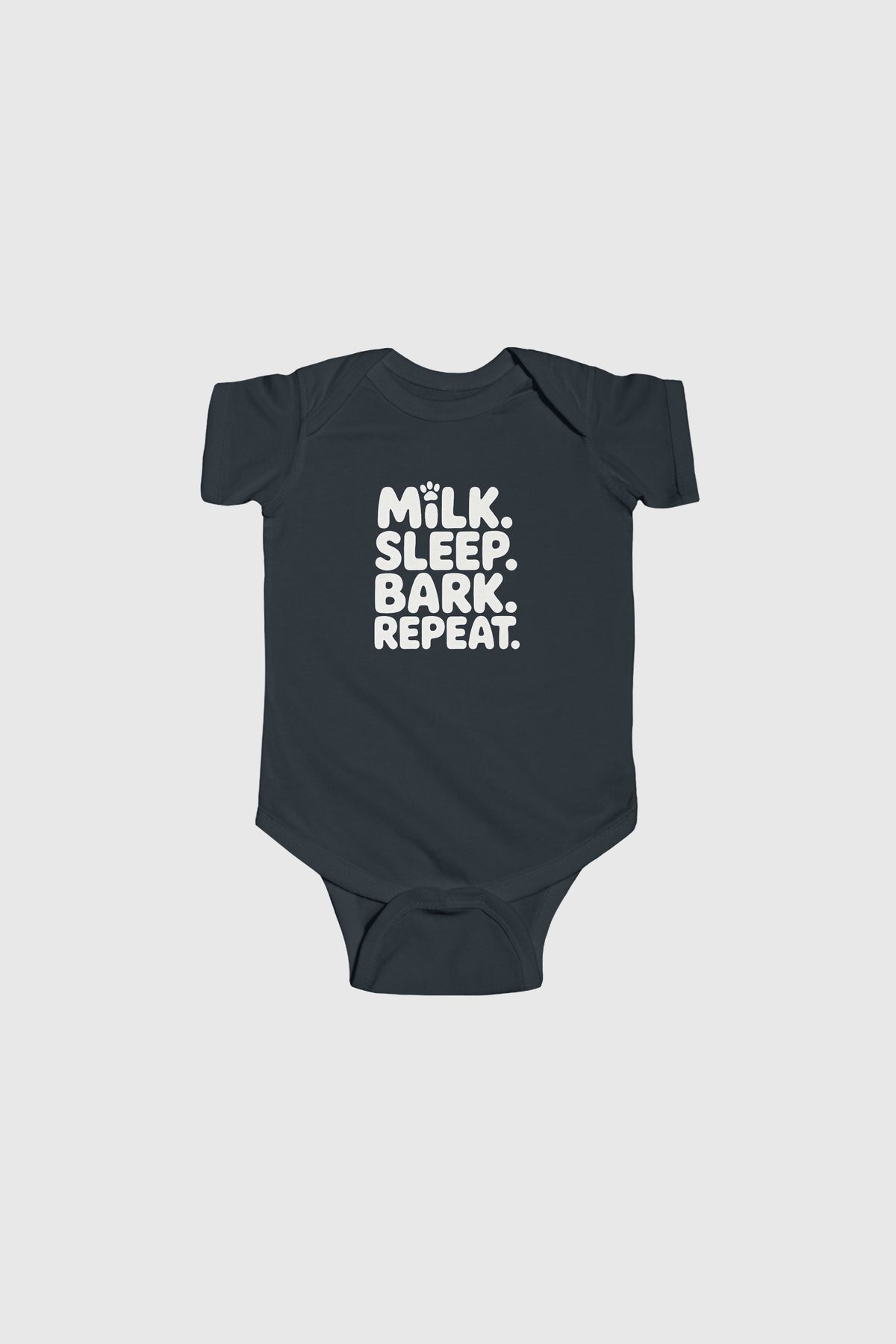 Baby wearing light blue Milk Sleep Bark Repeat bodysuit
