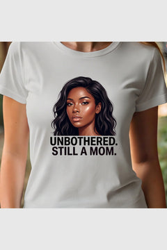 Woman wearing white Unbothered Still A Mom t-shirt