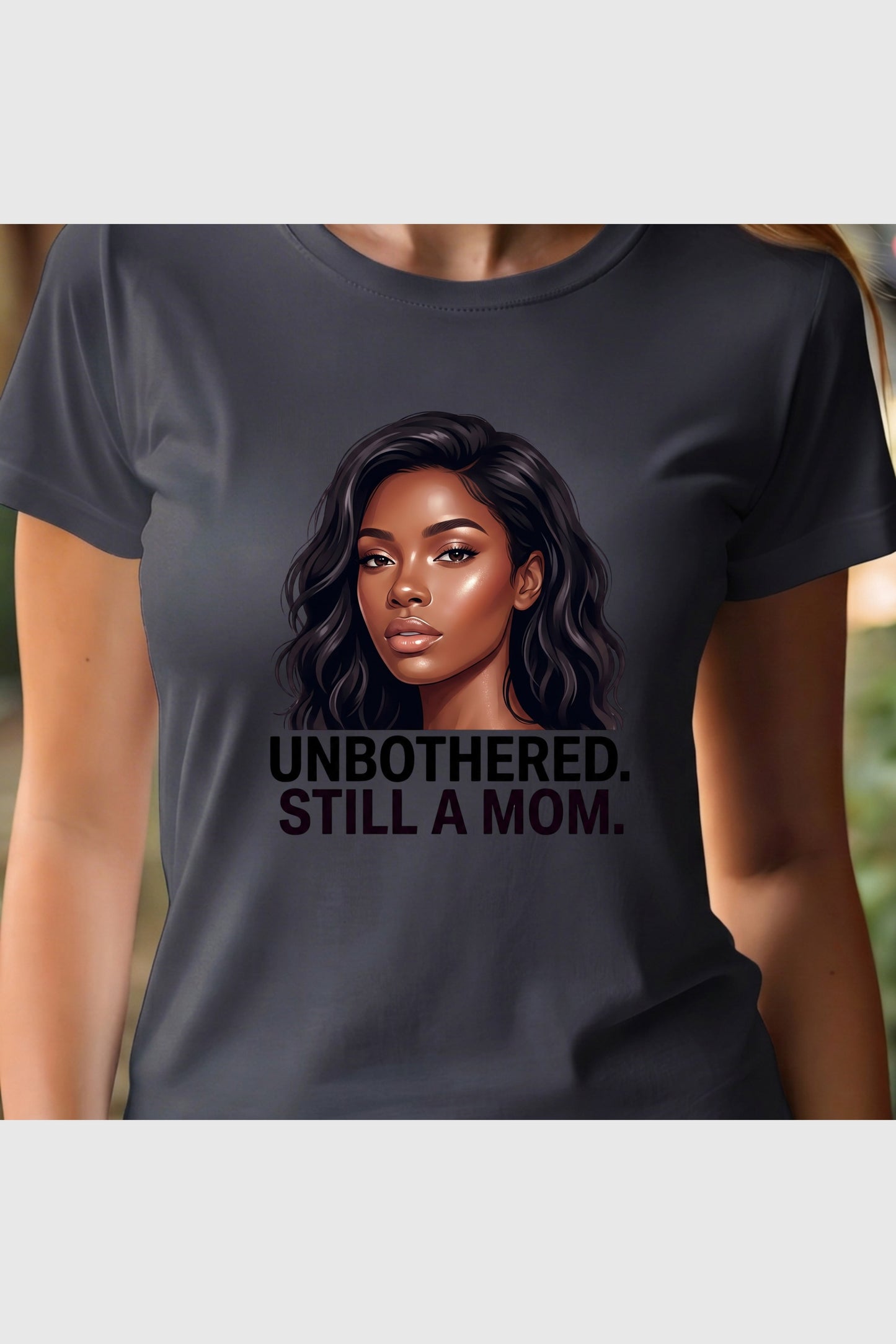 Unbothered Still A Mom print close-up on white t-shirt