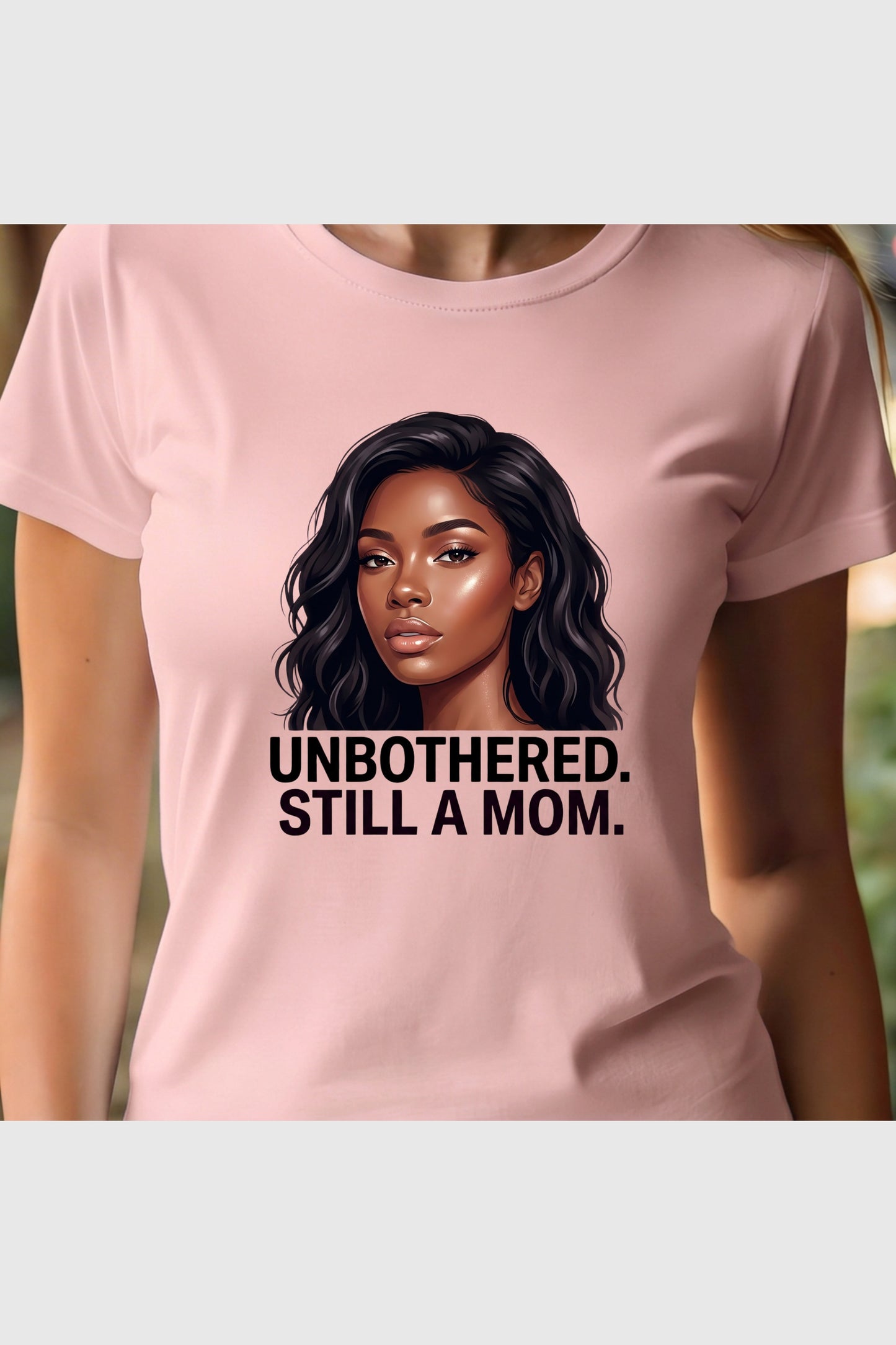Woman wearing black Unbothered Still A Mom t-shirt