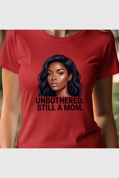 Man wearing black t-shirt with Unbothered Still A Mom print