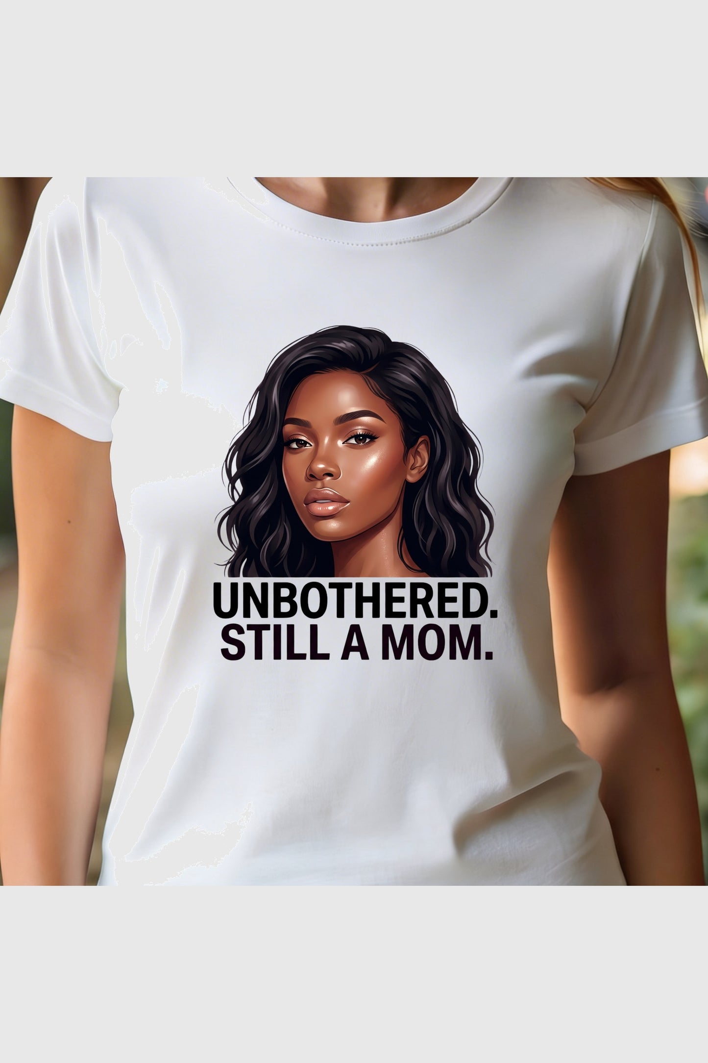 Unbothered Still A Mom print close-up on black t-shirt