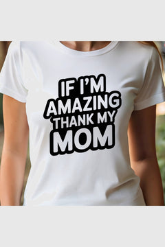 White t-shirt with If I'm Amazing Thank My Mom print, unisex crew neck