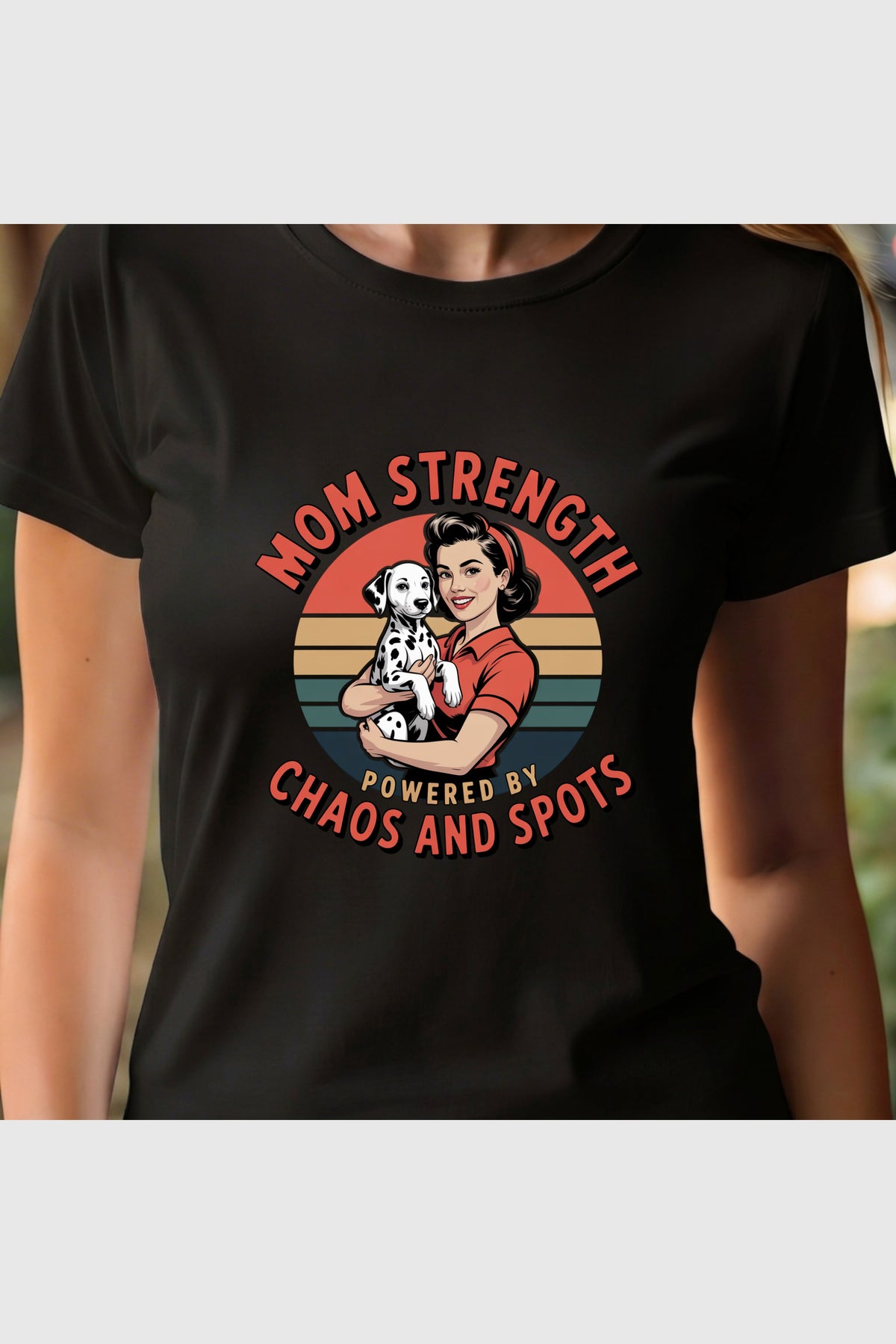 Man wearing white t-shirt with Mom Strength dalmatian print