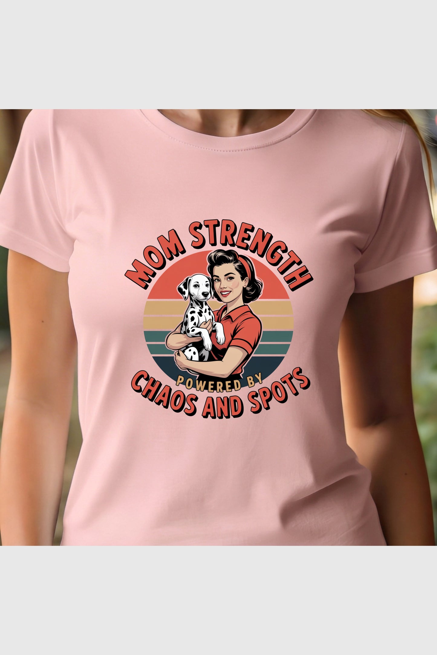Woman wearing black Mom Strength Chaos and Spots t-shirt