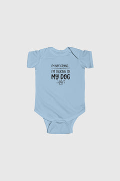 Light blue baby onesie with text on a light gray background
