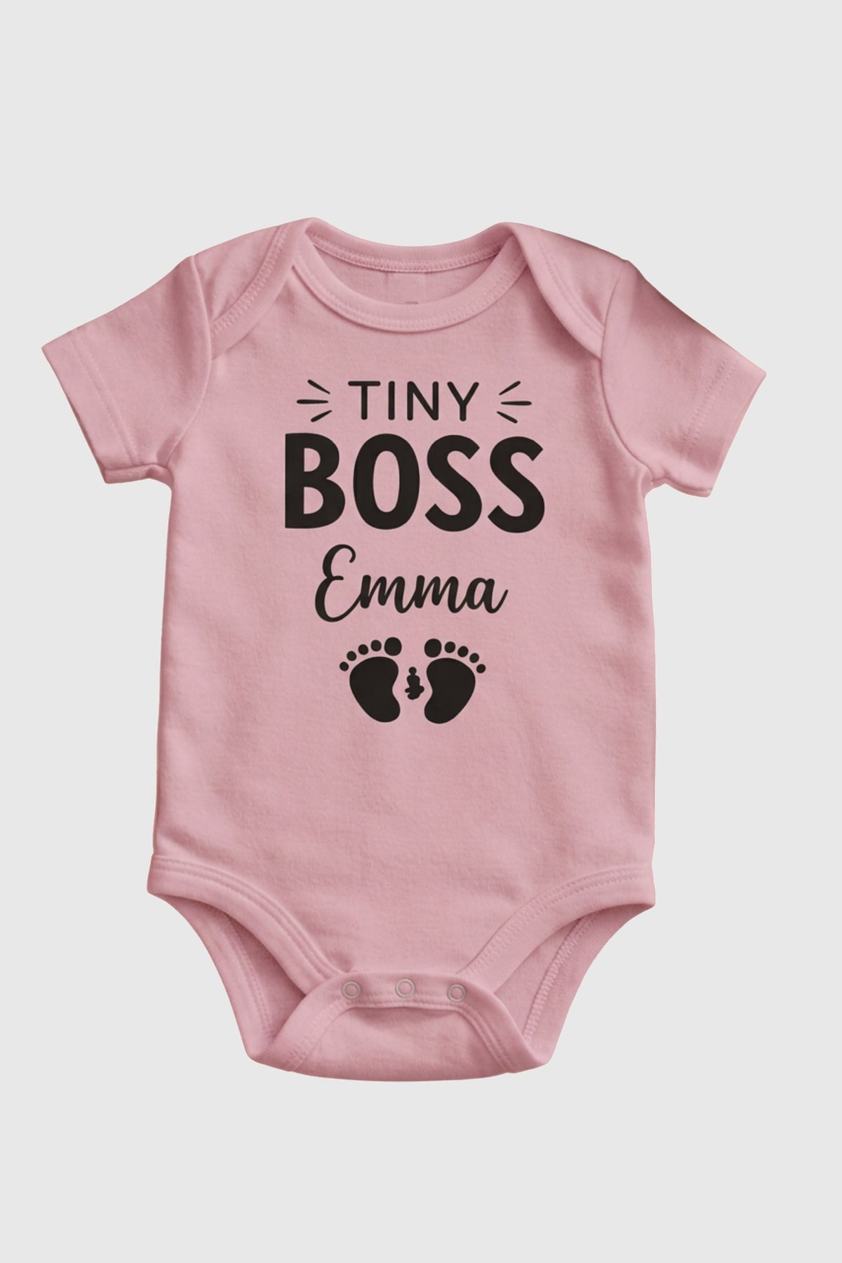 White personalized baby bodysuit with Tiny Boss custom name, snap closure