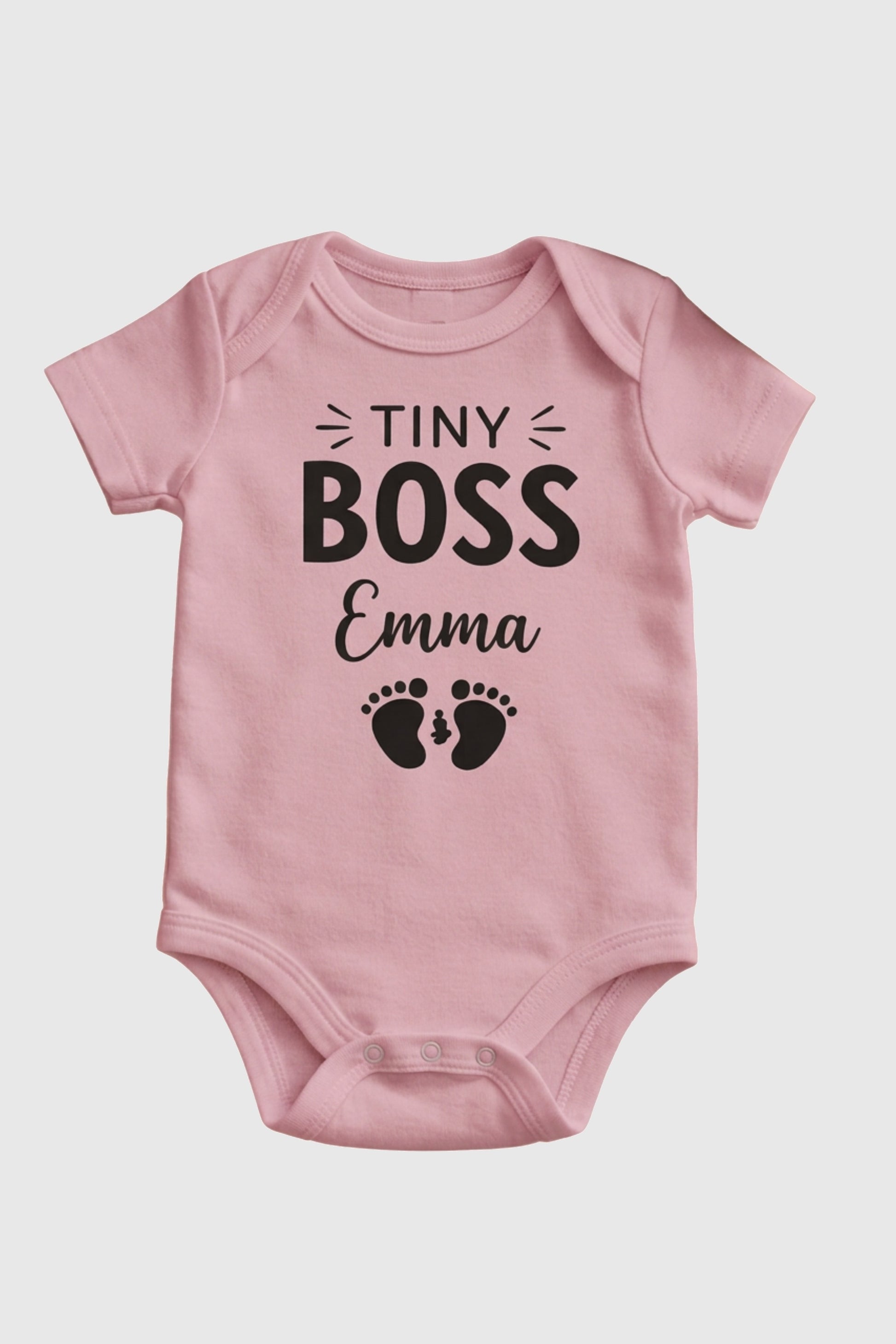 White personalized baby bodysuit with Tiny Boss custom name, snap closure