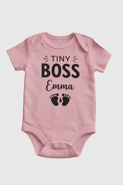 White personalized baby bodysuit with Tiny Boss custom name, snap closure