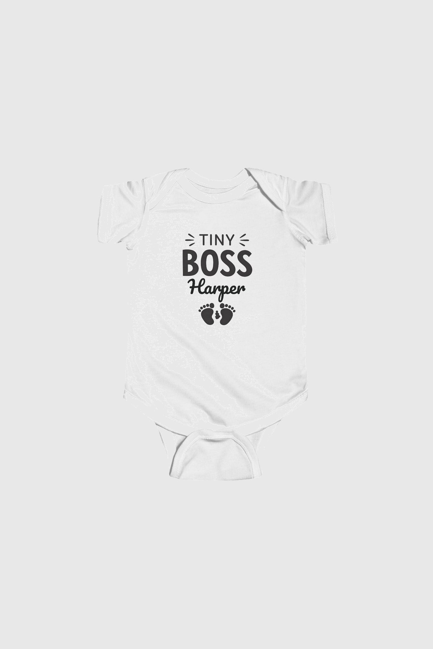 Yellow personalized baby bodysuit with Tiny Boss custom name, snap closure